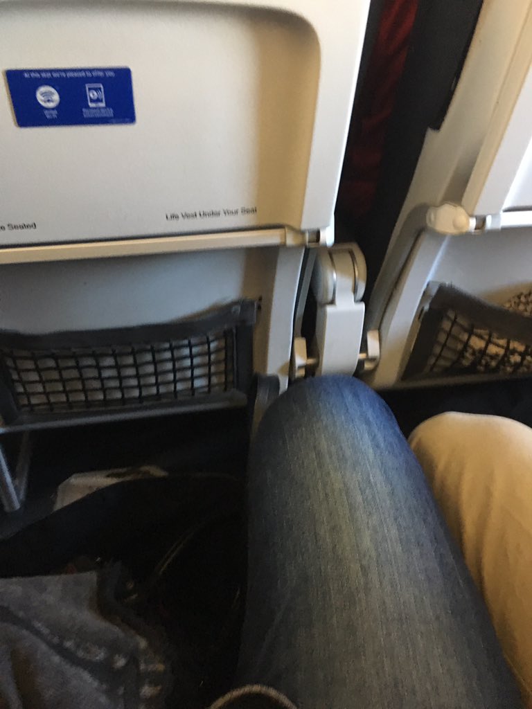 Sarcasticluther's tweet photo. I always feel it's my resist-the-Patriarchy duty to fight airplane seat manspread https://t.co/Ijgu168a0Q