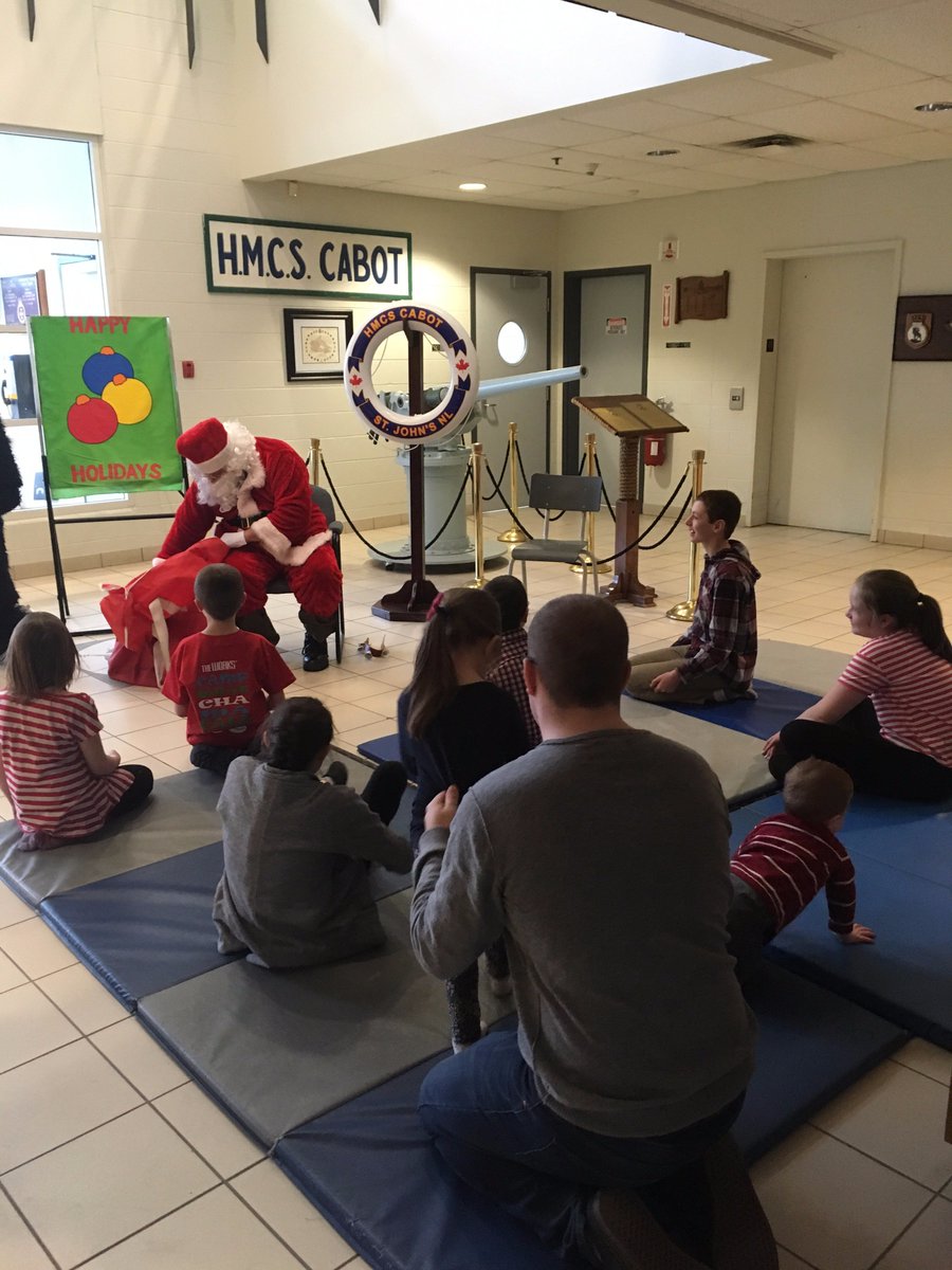 HMCS_NCSM_CABOT's tweet photo. There were two special guests at the Children's Christmas Party at #HMCSCabot this year, #Santa and #Sonar! @RCN_MRC @NAVRESNAV #HOHOHO https://t.co/ZyvvTUErFH