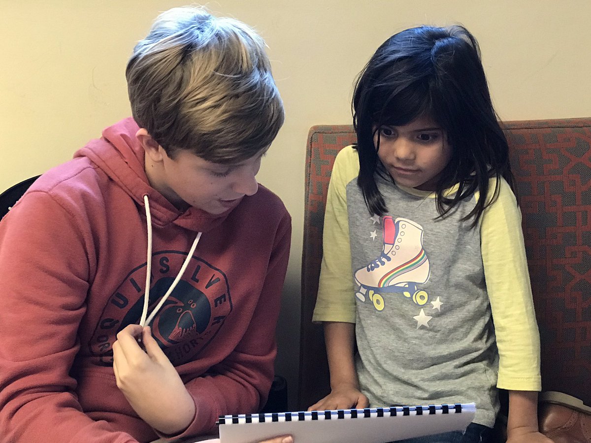 PolyHolmgren's tweet photo. Reading our finished stories to our K buddies. #PolyConnects https://t.co/ClBcA9x1NC