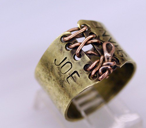 Artfire's tweet image. Give a #personalized #custimized #gift this #year with a #corset style #lace up #ring from WhimOriginals.artfire.com bit.ly/2hiTKnr