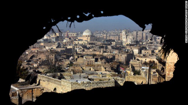 cnnbrk's tweet photo. Shelling has struck rebel-held neighborhoods in east Aleppo, activists in the city say, breaking a new ceasefire. https://t.co/TyFva0sZ1d https://t.co/AI3b63dVQx
