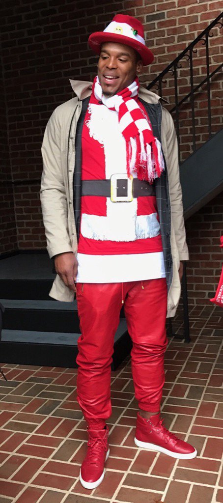 Cam Newton shows up as fashionable Santa to give $100K in food, gifts ...