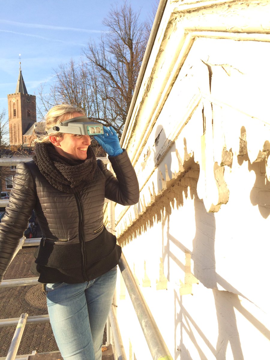 history_design's tweet photo. Willianne puts on her magnifying glasses for architectural paint research of a charming 19th century facade #historybydesign #workinprogress https://t.co/lQ4E0RCIhv