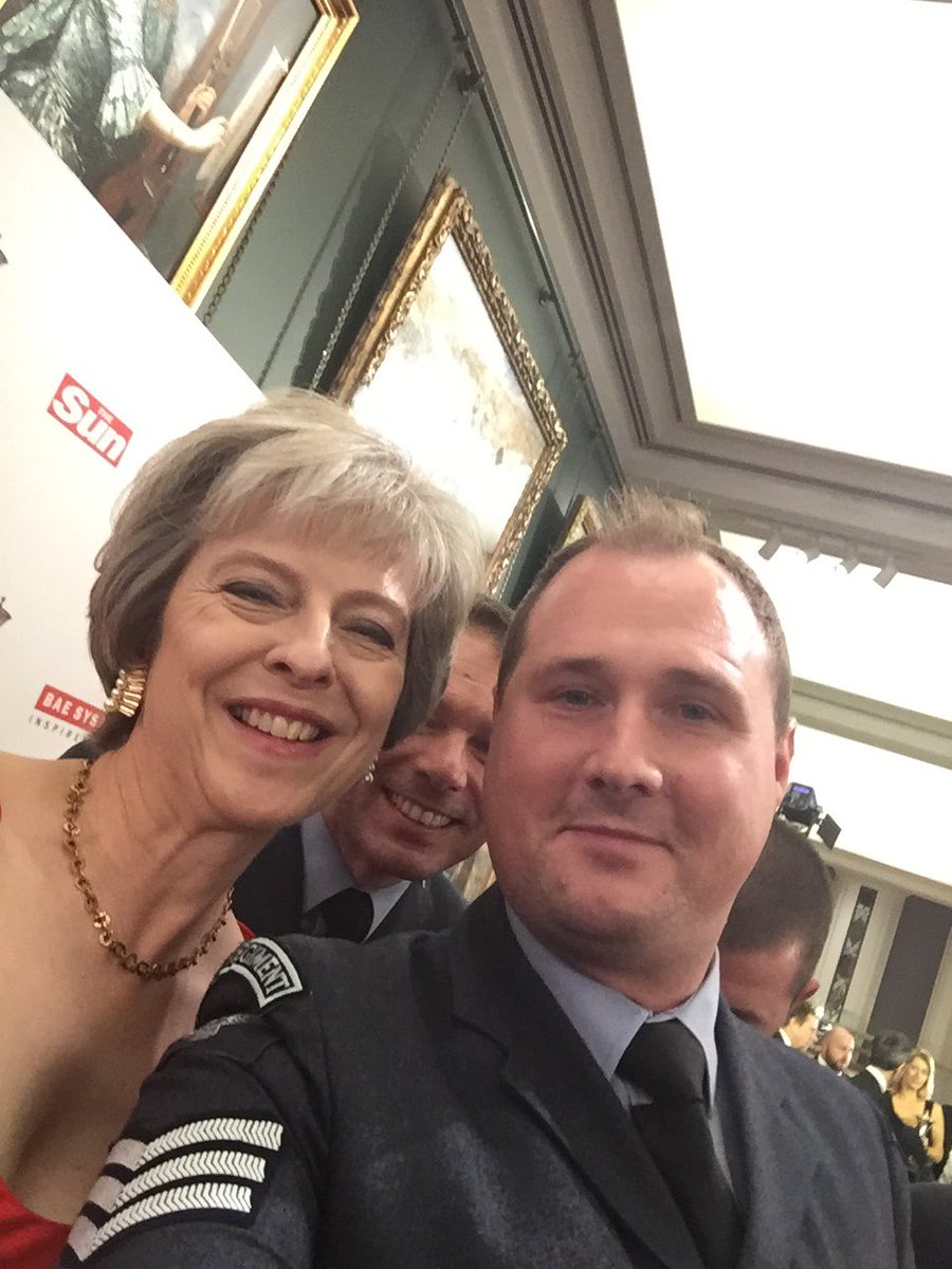 seanpercival's tweet photo. @theresa_may presenting my team an award at the Millie's https://t.co/chVQzAMGOL