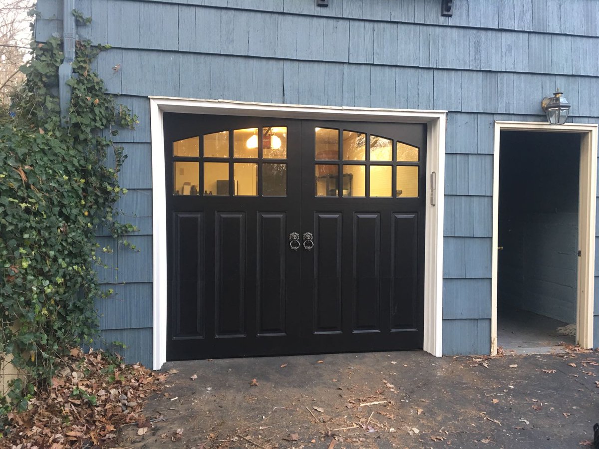 Before and after, Amazingly looking door by Fimbel ADS Black finish. 8550W Garage door opener, Custom Azek boards for perfect finish.