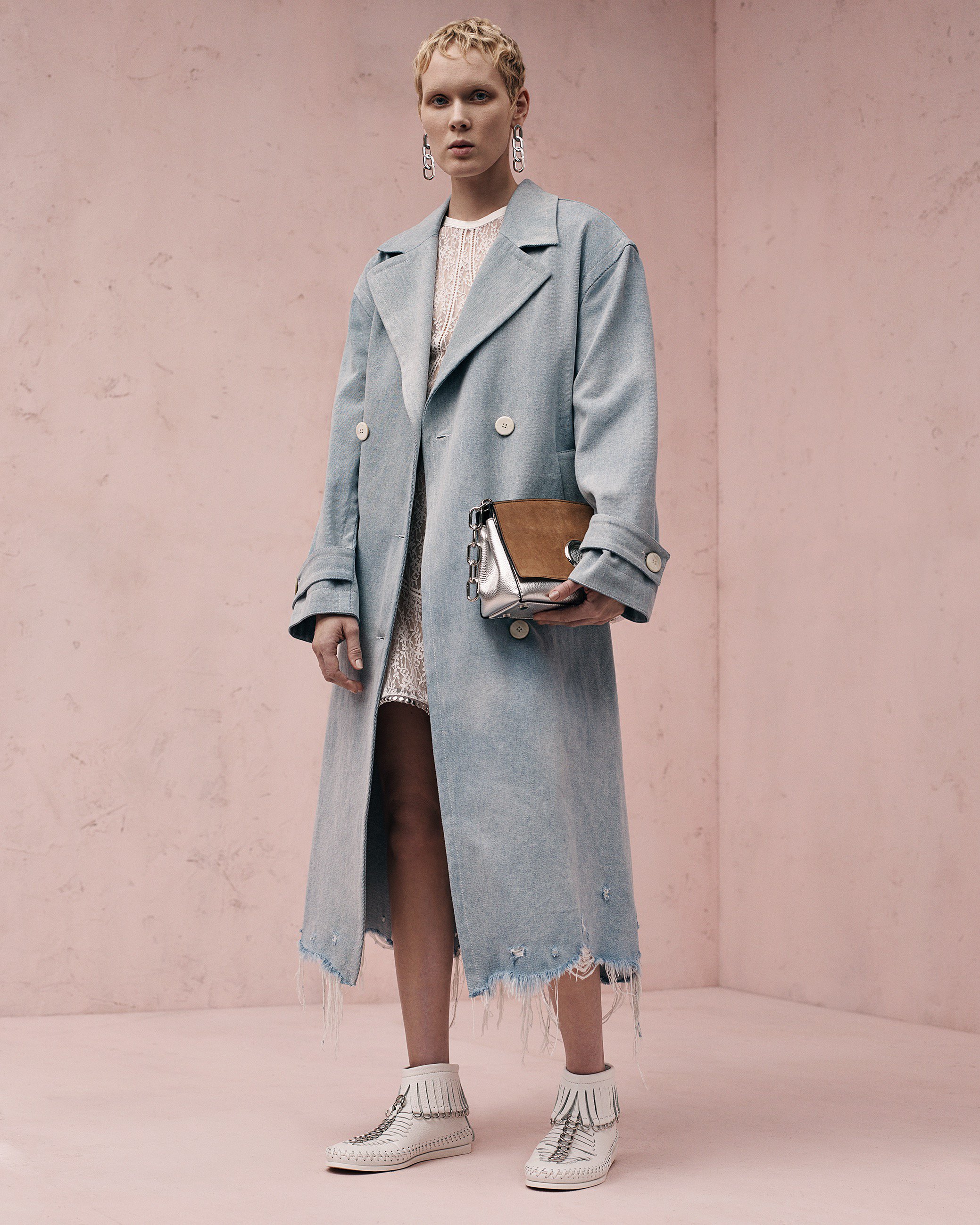 alexanderwang on X Mood indigo. Resort 2017 oversized denim trench coat with distressed hem available exclusively at the New York and London flagship stores. https t PVx4A6EJOg X