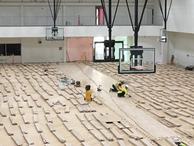 MedHatHigh's tweet photo. It'll be hard to keep the MHHS basketball teams out of the gym once the new hardwood floor is done! #MHHSModernization #GrahamConstruction https://t.co/npPivE1psL