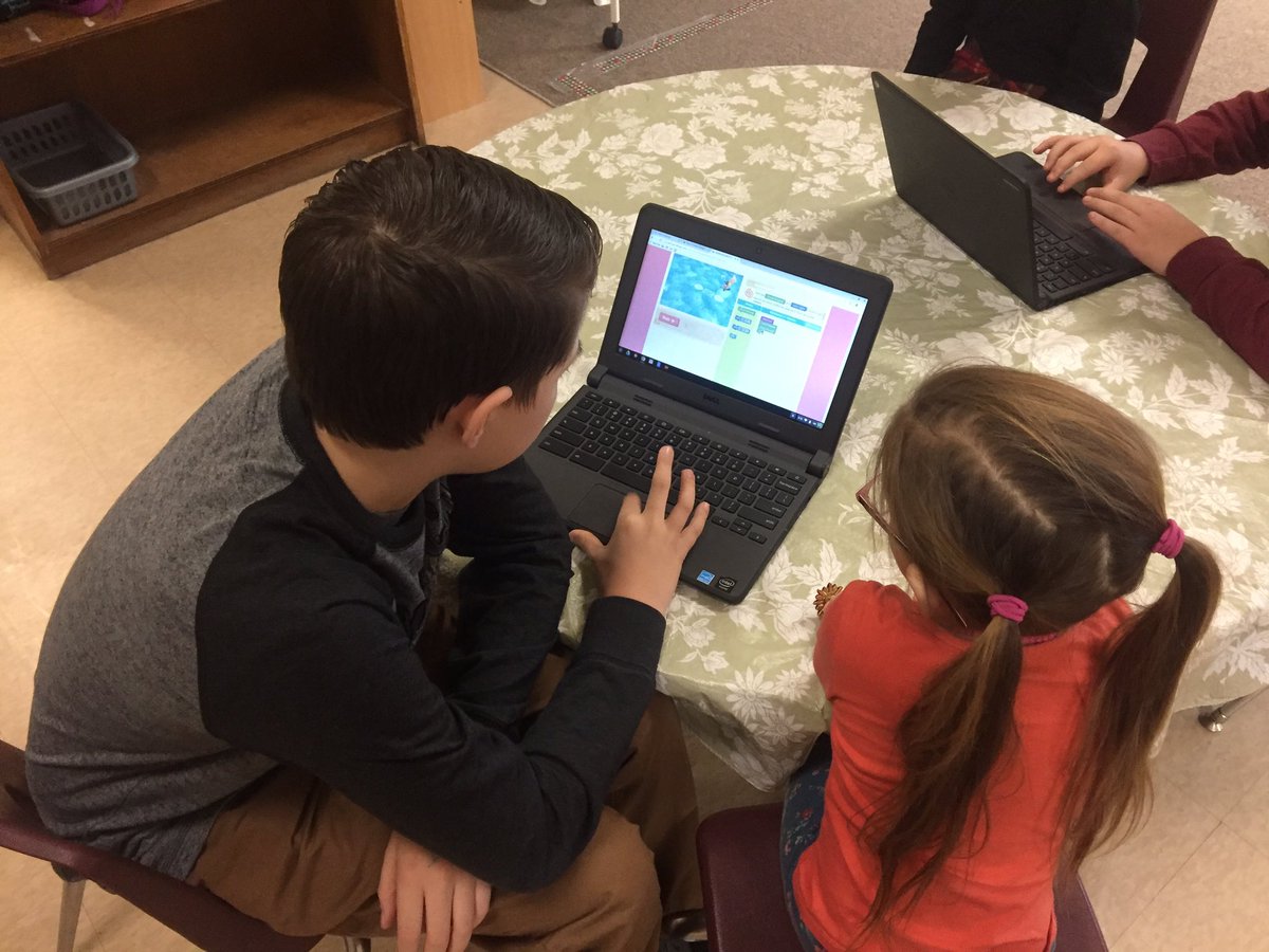 berardn1's tweet photo. Gr. 8 students teaching Kindergartens to CODE at NE https://t.co/27fuw8tLVs