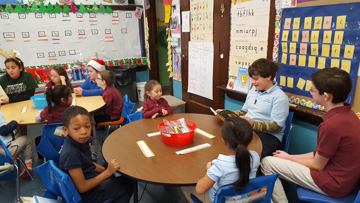 6th grade class officers making gingerbread houses with Mrs. Phillips' kindergarten class at John Adams. @nsis_scranton
