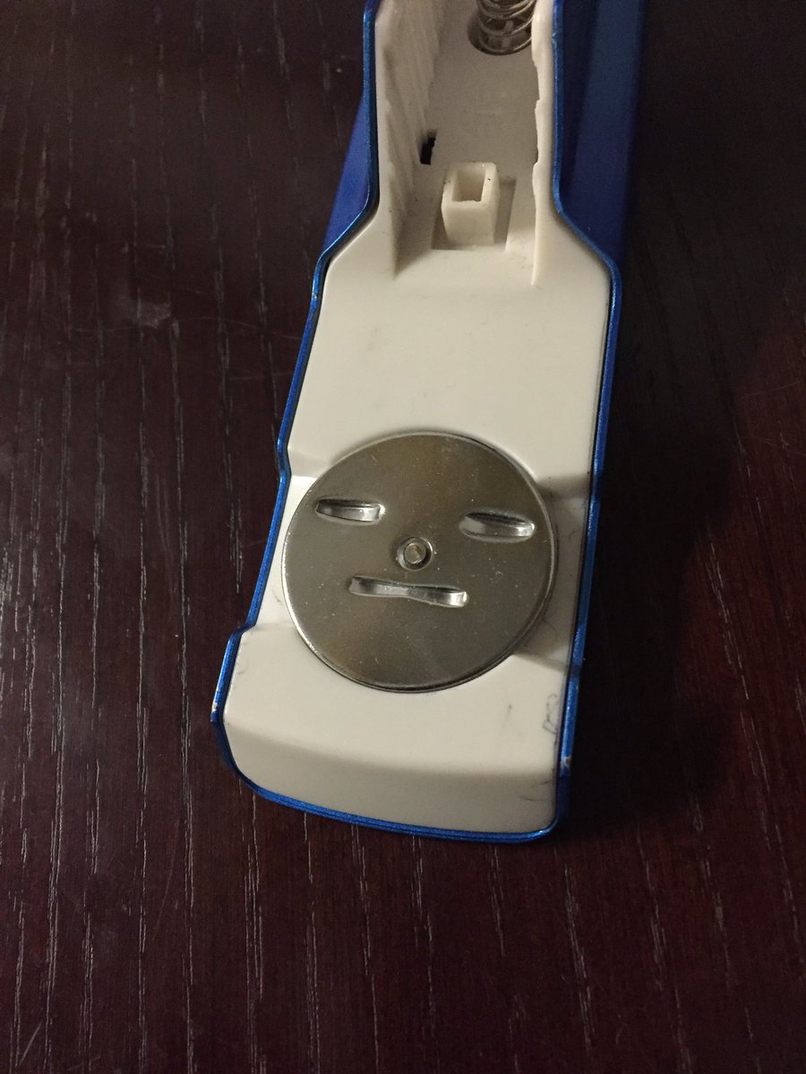 eyeseefaces's tweet photo. Sad little fellow inside the stapler. #paredolia #thingswithfaces https://t.co/sCLg8xEnGs