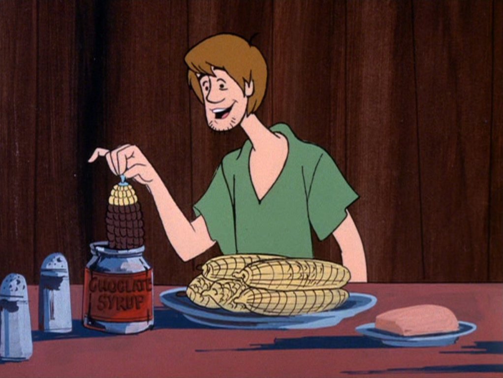 Scooby Doo And Shaggy Eating Scooby Snacks