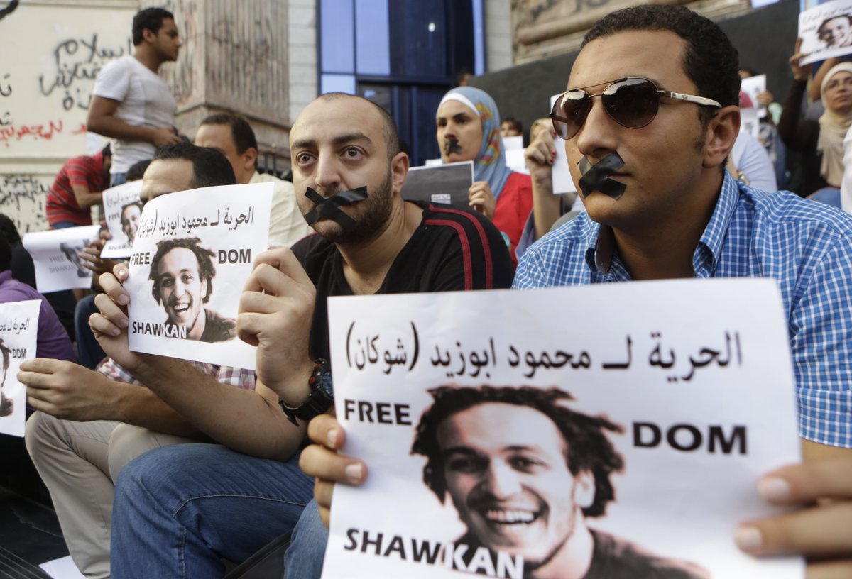 IFEX's tweet photo. The trial of photojournalist @ShawkanZeid  is delayed yet again to Dec. 27th. #FreeShawkan @afteegypt @CIHRS_Alerts @eohr_ar @anhri https://t.co/MPSMEthjsV