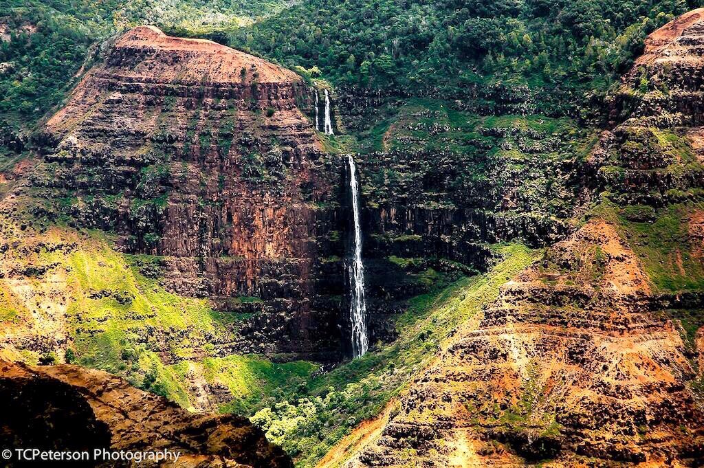 TCPetersonPhoto's tweet photo. Happy Friday from the #GrandCanyonofthePacific, HI!  #Seattle #RealEstate #Photography #WaimeaCanyon #waterfalls https://t.co/cCEzckhT8W