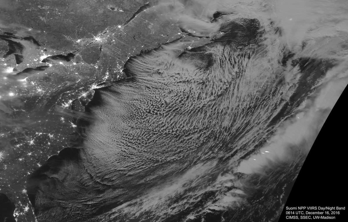 Meanwhile on the U.S. east coast, cold air conveyed in the clouds in this moonlit #VIIRS image. T-storms &amp; lightning streaks over the ocean!