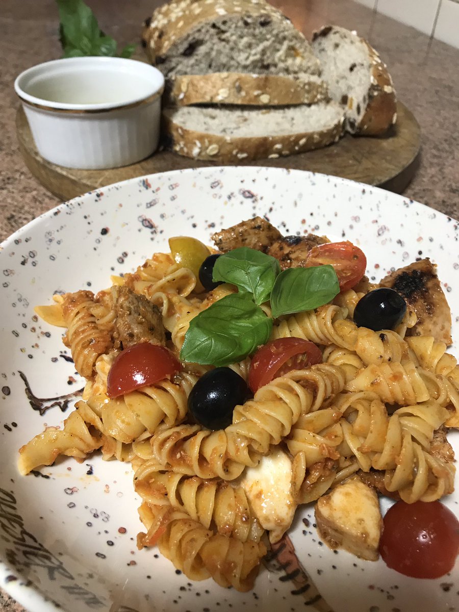 BASCEast's tweet photo. Pheasant pesto pasta with olives, tomatoes and mozzarella with a side of cherry and muesli bread and oil, topped with basil. Quick, tasty and healthy ..you really can’t beat it. #GameMeatMonday #HealthyFood #sustainable #organic #tasteofgame https://t.co/uMJ2PjVq0H