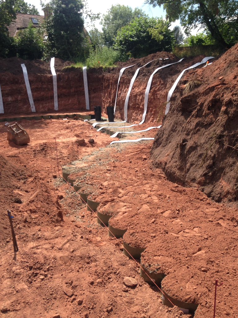 BoughtonButler's tweet photo. Last week we were on #site at our #contemporary #newbuild in #Shrawley #Malvern #Worcestershirehour to see how the retaining wall was coming along! Stone cliffs exposed! We provided all #planning and #architectural services and it'll be out of the ground soon! https://t.co/OssNQRS4Z4