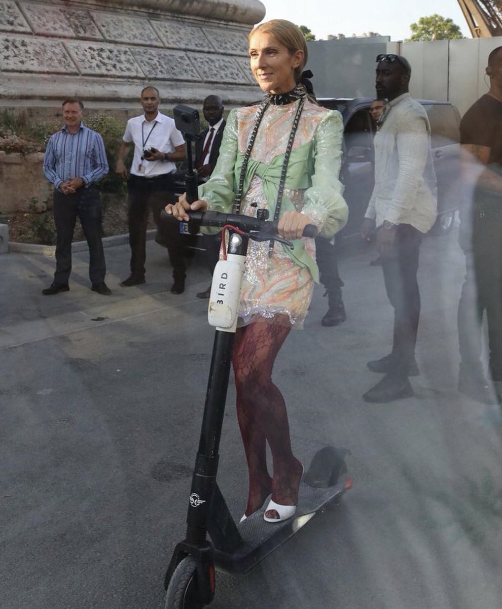 gabrielabarkho's tweet photo. celine dion riding a bird scooter under the eiffel tower is all i've thought about today https://t.co/N3wzz6NJoM