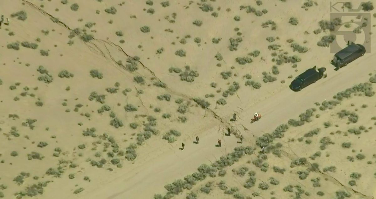 Sky5 is over the apparent fissure in the area of last night's magnitude 7.1 earthquake near Ridgecrest: on.ktla.com/xVXWs