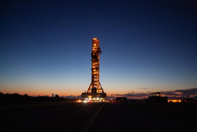 Mobile launcher lit up in nighttime image