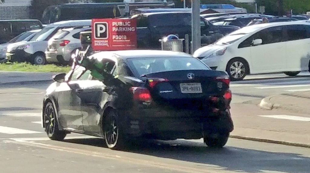 SxTroll's tweet photo. What could possibly go wrong?! A sedan with scooters sticking out of every orifice! #scooters #DocklessMobility #AustinScooters https://t.co/Lk8CX8xUML