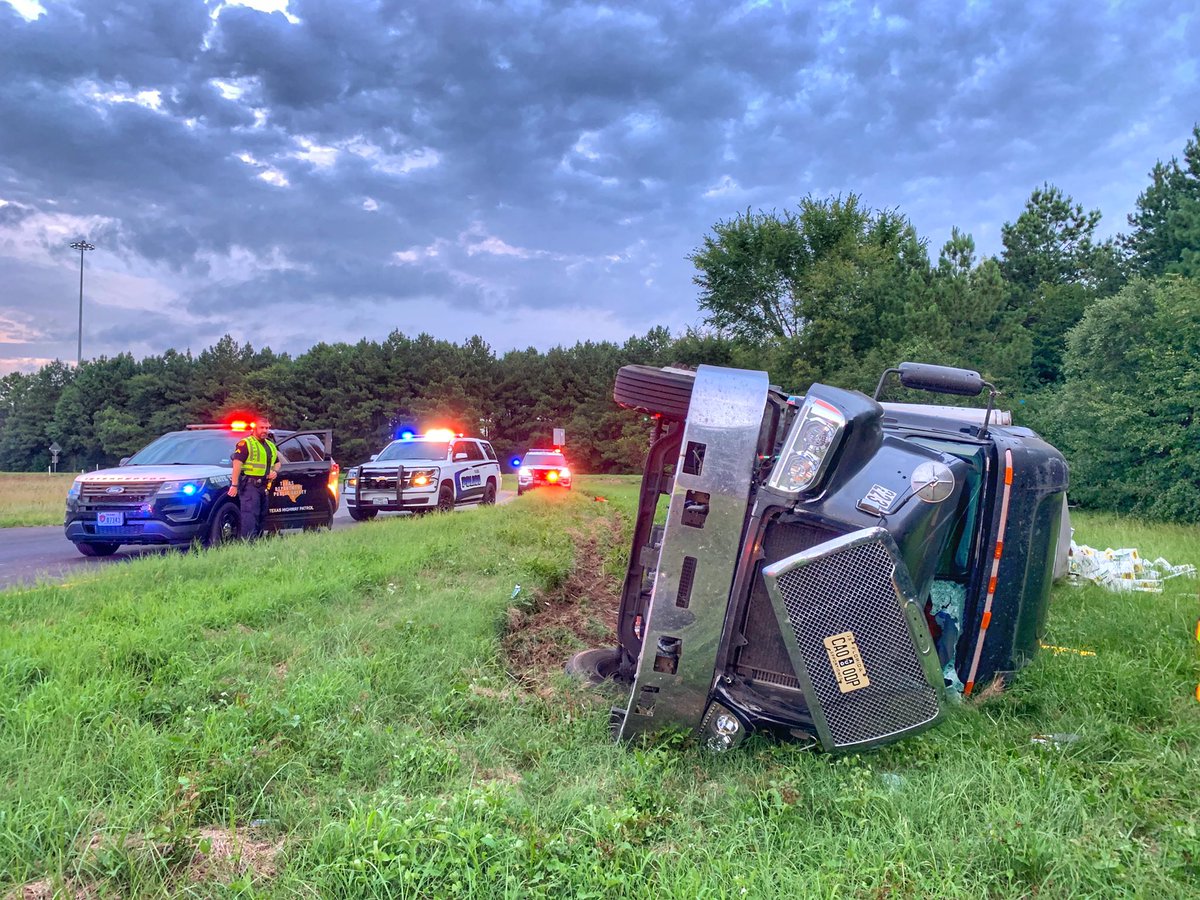KilgorePolice's tweet photo. KPD and KFD are out with a rollover truck tractor trailer crash on I-20 MM 589 EB exit to Post Oak Road. Watch for exit closure for truck and cargo recovery.  Fortunately the driver was uninsured. https://t.co/HTIv41Ob7P