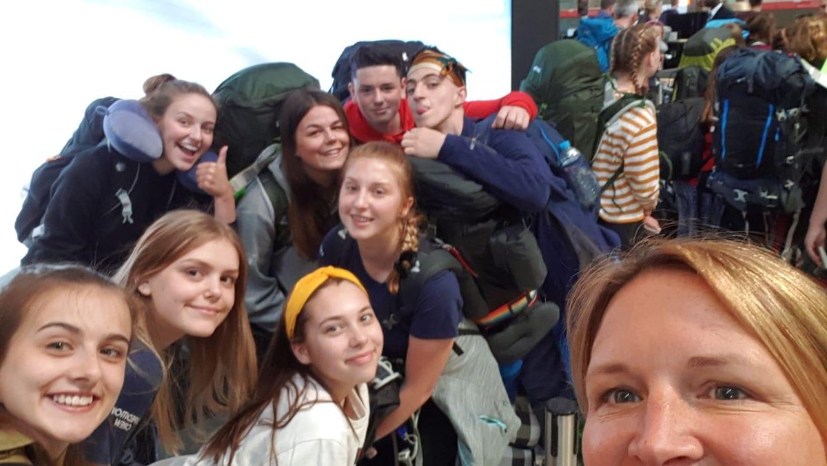 HenleySchool's tweet photo. Ms Thompson is at the airport now with a group of your young people who are about to spend 4 weeks in Ecuador with @CampsInt - they'll be undertaking life-changing work, including helping to build a new school in the area #Excellence #TeamHenley #GivingBack #LifeChanging #Ecuador https://t.co/G7y8lk4OS3