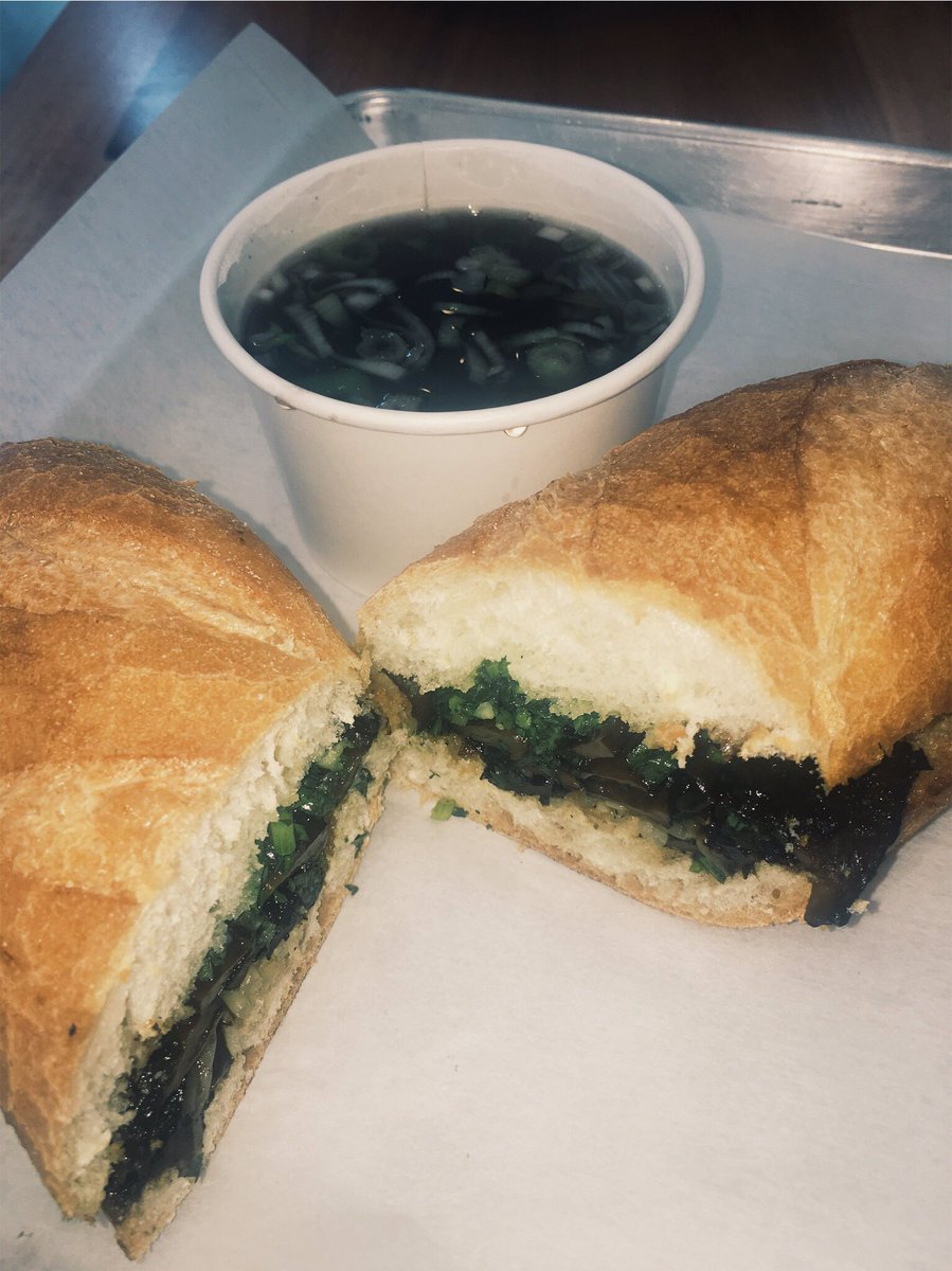sassyveganista's tweet photo. #stveg #pho #flavorbomb #phodip #vegan #plantbased Slow roasted portabello mushrooms in hoisin barbecue sauce, fresh chimichurri spread, sautéed bean sprouts, onions and leeks on a toasted baguette! With Pho broth to dip! https://t.co/AlurrsHPyY