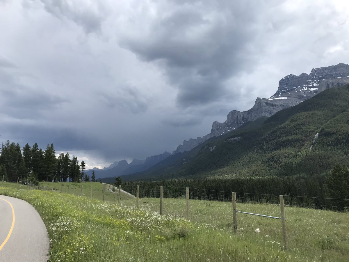 davidwhitepeng's tweet photo. We rode bikes to Lake Minnewanka in Banff today. It was a nice ride. We had a Jeep pass too close on the road to the lake. I’d tried to warn the driver that there were cars coming down the hill. He passed anyway and the descender was an RCMP officer. The driver won a ticket! Yeah https://t.co/ULeW014aJ9