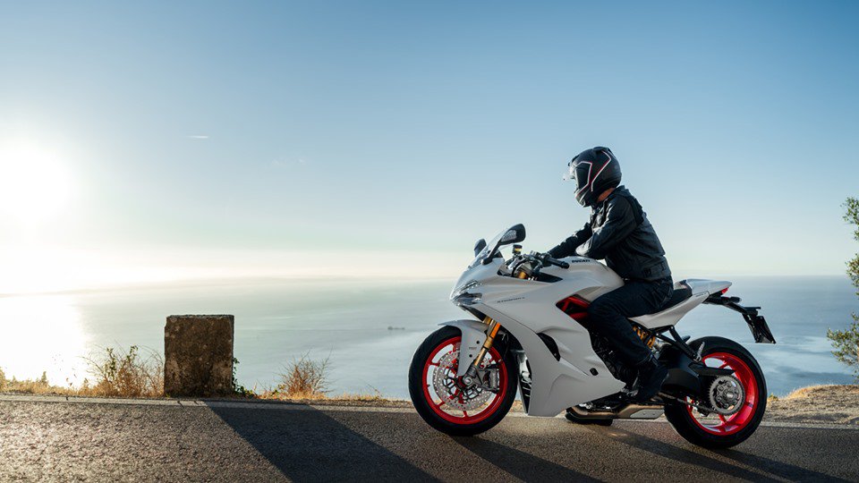 Ducati_Pune's tweet photo. What drives you? For some of us, it is the thrill of the open road, for others it is the pursuit of something greater. Our destinations may be different, but our soul is the same. Know more about the Ducati way of life by visiting us at https://t.co/F6sVmeNTkk #WeareDucati https://t.co/QsBgxMptFb
