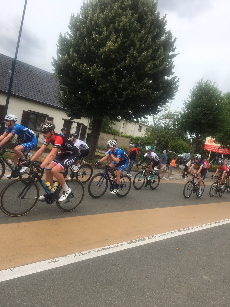 Two riders off the front with about 20 secs, third of the race gone. Spokes all in the main peloton.