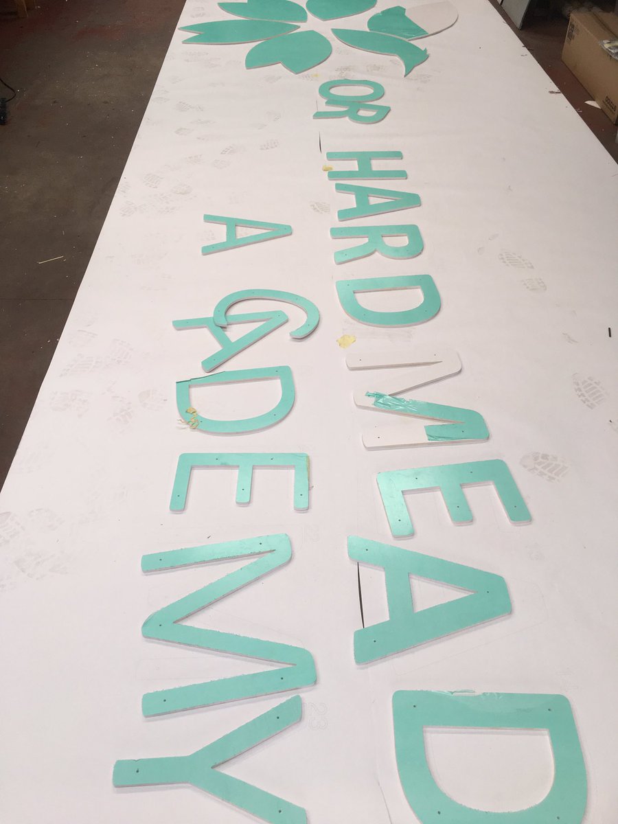 FocusSigns's tweet photo. #teamfocus. Putting together signage templates for our next new project. Install week today. https://t.co/EDUe48UzIq