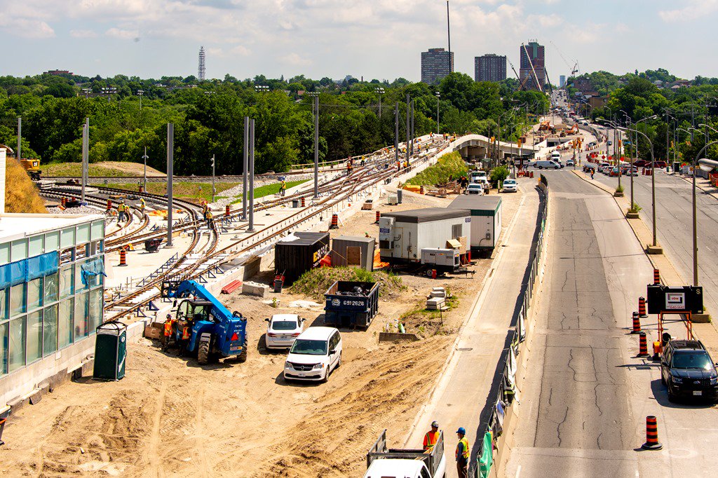 CrosstownTO's tweet photo. #Views looking over Mount Dennis Station down the Elevated Guideway, where poles to support the overhead power lines are going up! https://t.co/HueDRX1iZK