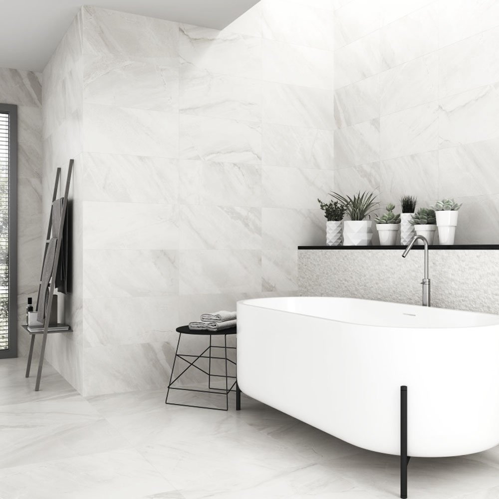 Did you know? One of the advantages of using the same tile on both floor and wall is that the room will look much bigger! #continuityiskey