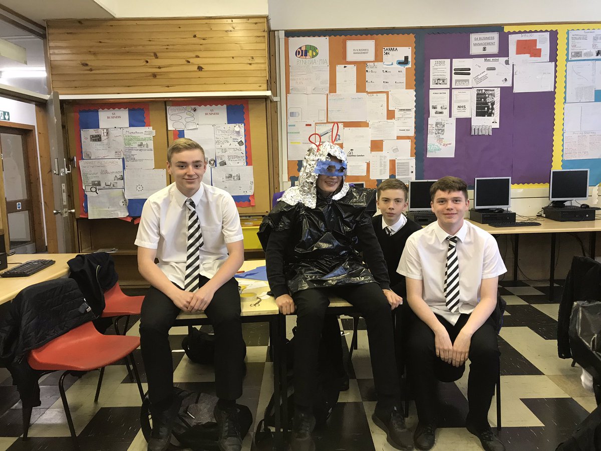 IHSbusiness's tweet photo. Festival fun!!! Business students creating ponchos with a difference!  Each with a USP. Thanks to @tutor2uBusiness for the idea! https://t.co/wkaRtKSzsT