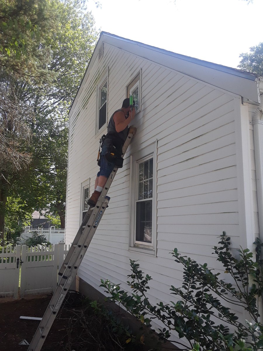 Installing a new window @ Sutton Street in #Weymouth #SouthShoreMA #HomeRestoration #HomeRenovation