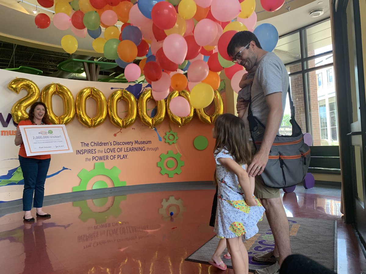 Robert Kohaus and his three daughters were dubbed the 2 millionth visitor at @DiscoveryMuseum in @uptownnormal today.

Their reward? Free ice cream, a prize pack, and 650 dropping balloons. bit.ly/2NcvF2Z #CDMPowerofPlay #BloNo