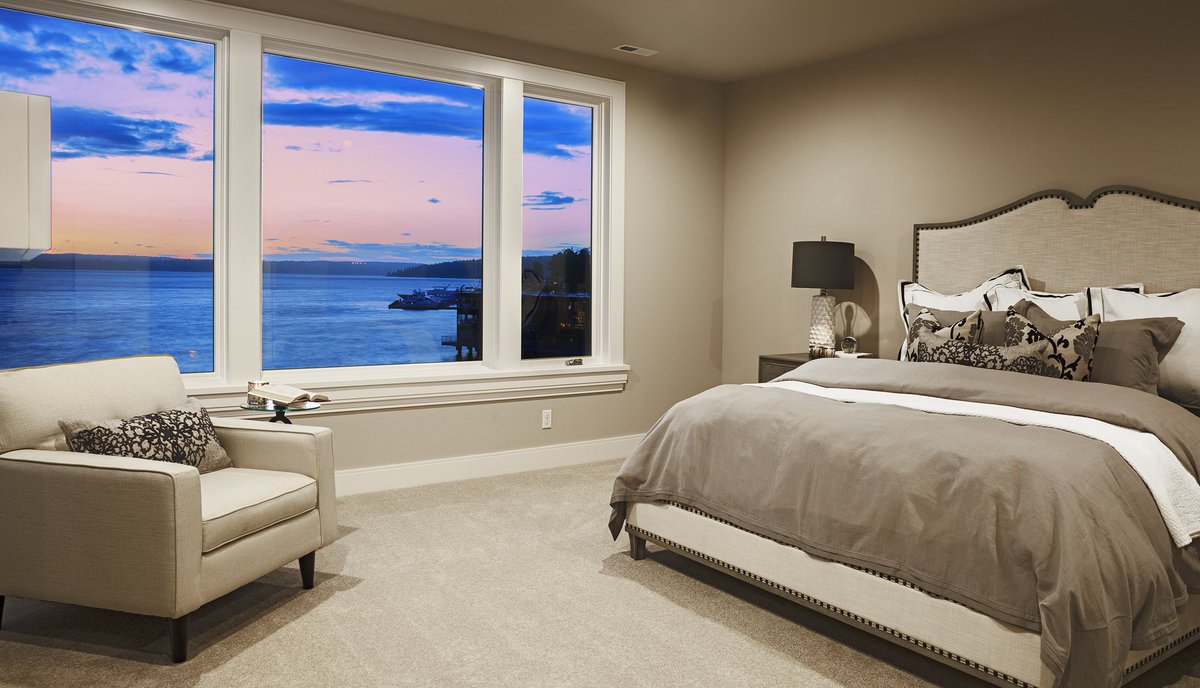 Natural light and large windows can boost overall mood in a bedroom. Relax in a simplistic bedroom design with an extraordinary view of the PNW scenery.
 
#customhome #dreahome #dreambedroom #luxurybedroom #bedroomview #pnwhomes #viewfromhome #windowvieew #simplisticstyle #modern