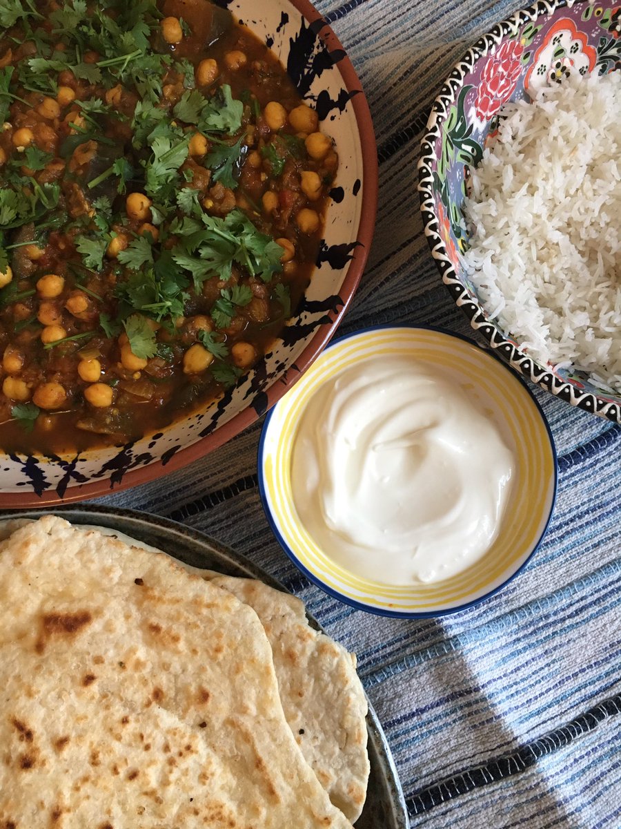 feedingtherest's tweet photo. I made @Prashad_veggie chole from the cookbook (with added aubergine to use it up) and coconut parathas to make it an EXTRA special meal.  #Prashad #VegetarianFood https://t.co/MNYyAHCXUZ