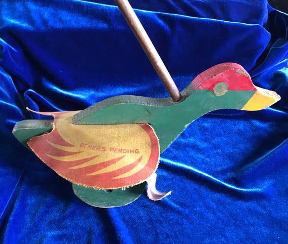 Yellowonetsy's tweet photo. Wooden duck toy w flapping feet, 1939-1940. Appears to be a prototype. This was my Dadโs when he was little. I donโt think it was ever manufactured. For sale at https://t.co/92BjKTFNLm. #vintageshowandsell #vintagetoy #pushtoy #duck #ducktoy #antiquetoys #vintage #prototype #toy https://t.co/xB6EeAftLZ