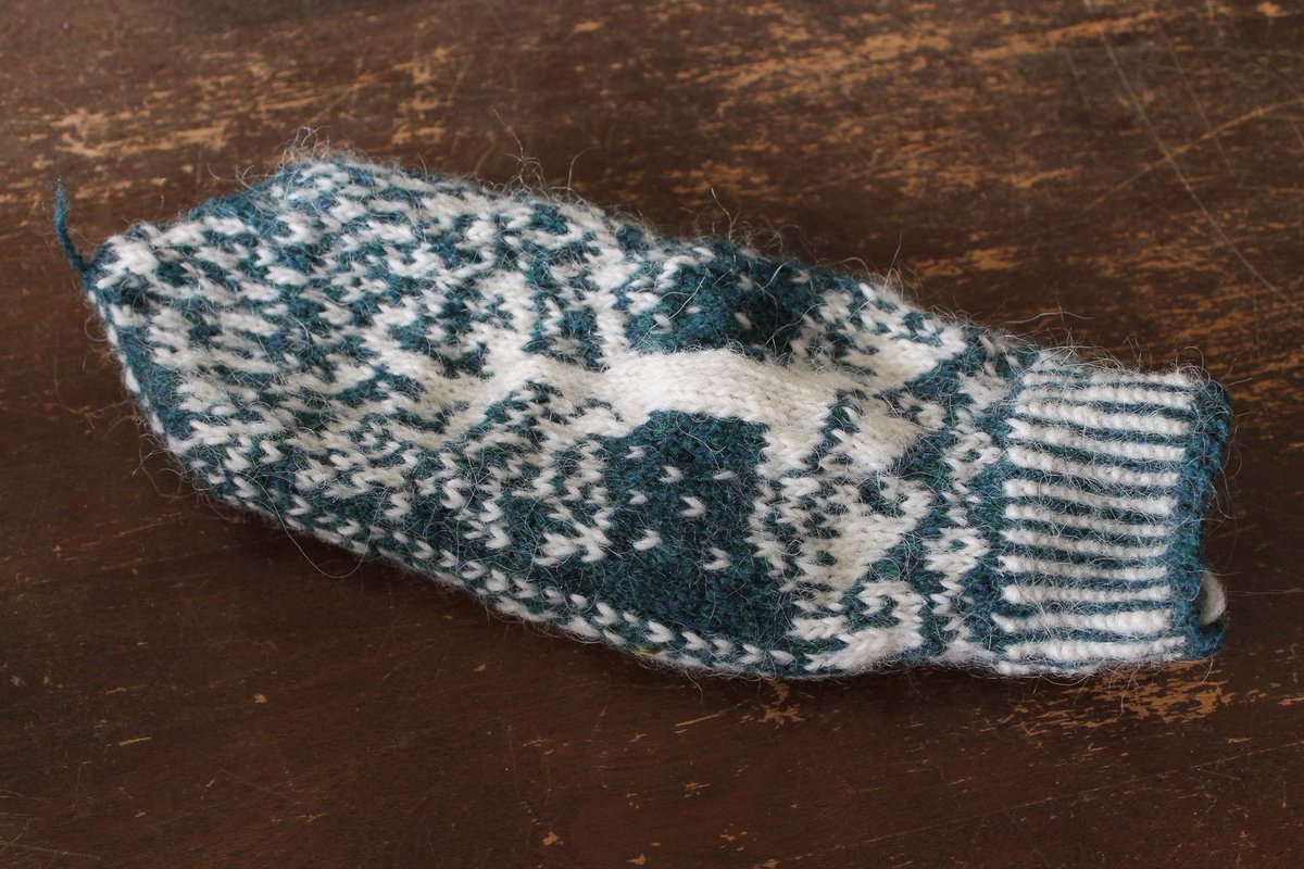 Another type of knitting is colourwork. These fancy bastards are a pair of mittens I made last winter: