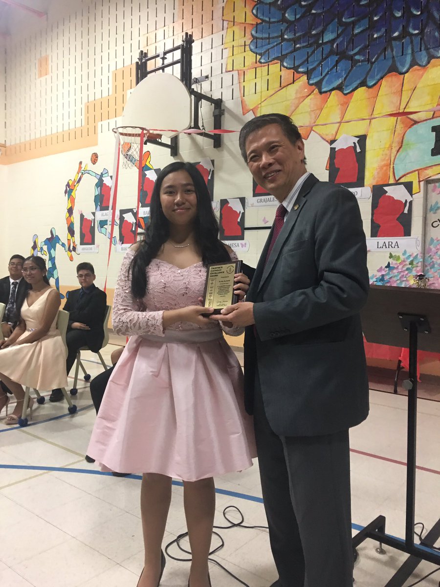 SHCSCHOOL1's tweet photo. Thank you to Trustee Garry  Tanuan for joining @SHCSCHOOL1 and bringing greetings from the Board during our Grade 8 Graduation! Thank you Garry for your continued partnership and for honouring one of our graduates with the Trustee Award! @tcdsb @TCDSBdirector #webeling @GTanuan https://t.co/MNIDuj8TJT