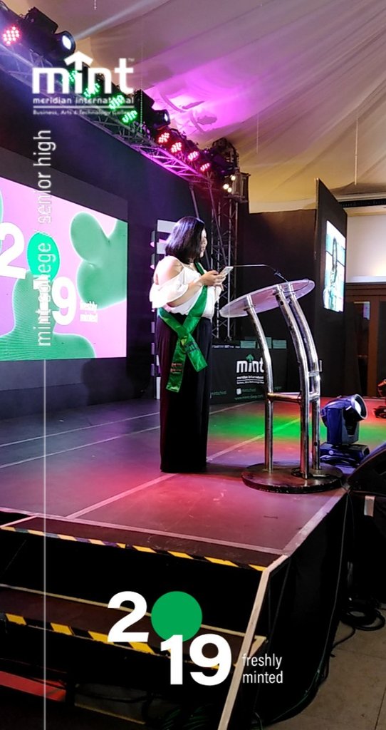 mintschool's tweet photo. Ms. @__isagarcia, #MINTHigh Adviser, recalls fond memories with Batch 2019 in her Welcome Remarks, eliciting cheers and chuckles from her students. #FreshlyMINTed2019 https://t.co/sChg5ktSPq