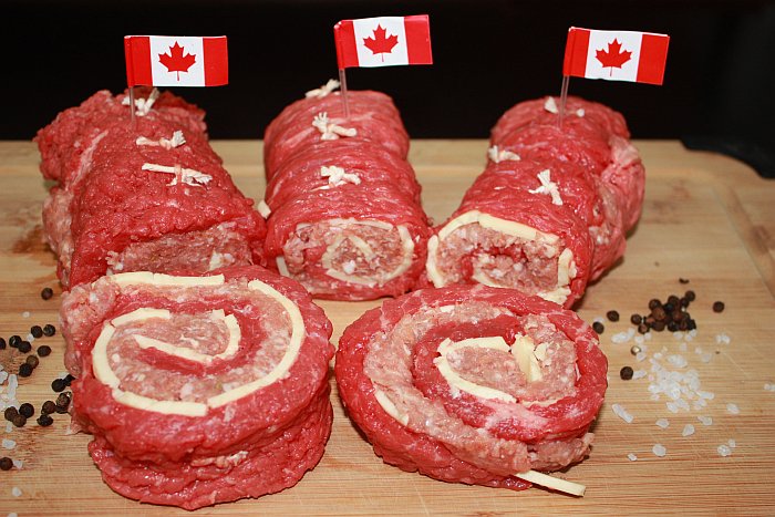 Othmar53's tweet photo. Celebrating #CanadaDay in a special way with my new meaty creations, the Canadian pinwheel made of succulent tender beef round steak filled with Mozzarella cheese and mild Italian sausage stuffing. The ultimate Canadian whiskey/maple pork sausage is my own recipe. #MakeItMeat https://t.co/t42rYBFI3h