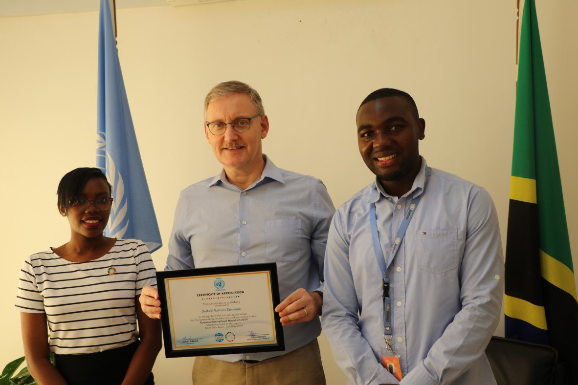 UnitedNationsTZ's tweet photo. Yesterday @Alvaro_UNTZ received a certificate of appreciation for our support to this year's Tanzania International Model UN (#TIMUN2019)!
We supported it together with @UNFPATanzania & @UNICEFTanzania & will continue supporting youth engagement in #SDGs.
#Youth2030 #UNTZ https://t.co/OdAtl2qAW1