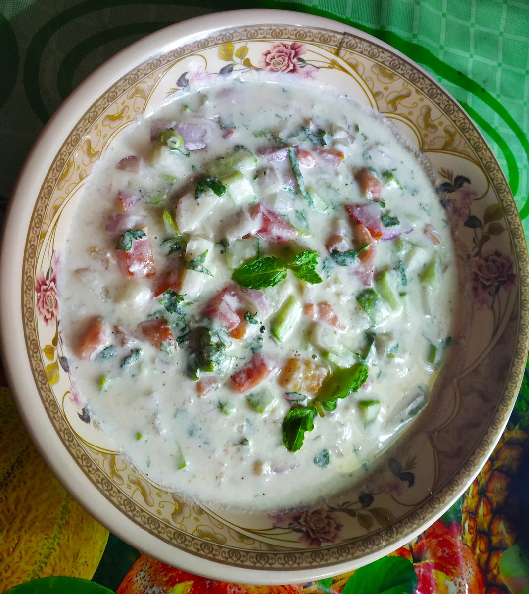 95. Kachhi Biriyani & Raita.