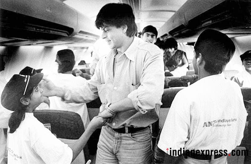 srkfcudr's tweet photo. Rare picture of King Khan @iamsrk after winning 🎀his First ever #filmfare award, met with some orphan Kids in a plane. 😍
#KingOfHeart @jiteshpillaai @filmfare @bombaytimes @timesofindia @theabbasmustan  #FilmfareAward #ShahRukhKhan #27YearsOfSRK https://t.co/TUrMGDVzhB