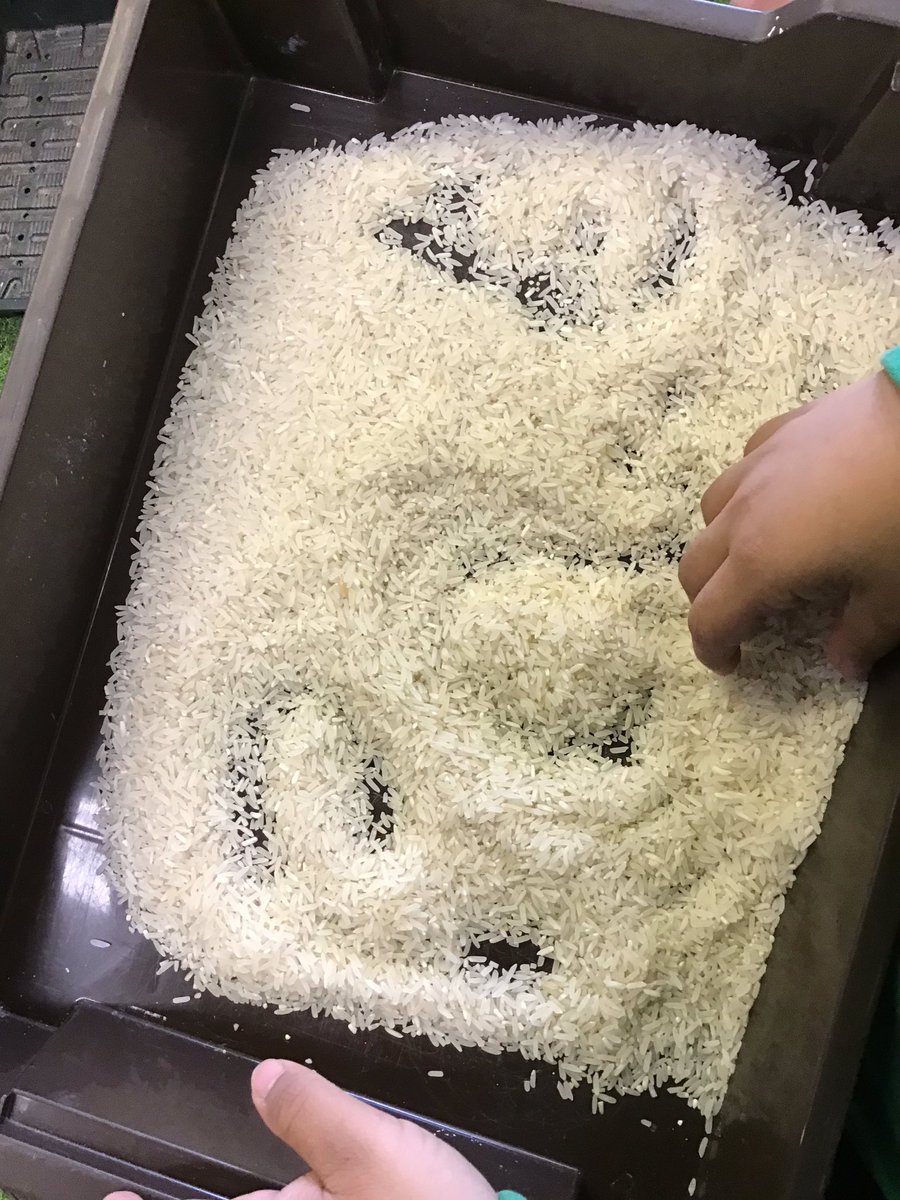 AbbeysL8's tweet photo. We enjoyed writing our words in rice; segmenting and a sensory experience all in one. https://t.co/Jt2RIiUbAI