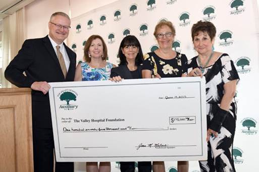 ValleyAuxiliary's tweet photo. We are on our way toward fulfilling the $3.1 million pledge with this donation presented to the  @TVH_Foundation at the recent Annual Luncheon of the VHA! Our members truly believe in The Power of Giving! @ValleyHospital #auxiliarypride https://t.co/89Ue14HLqS