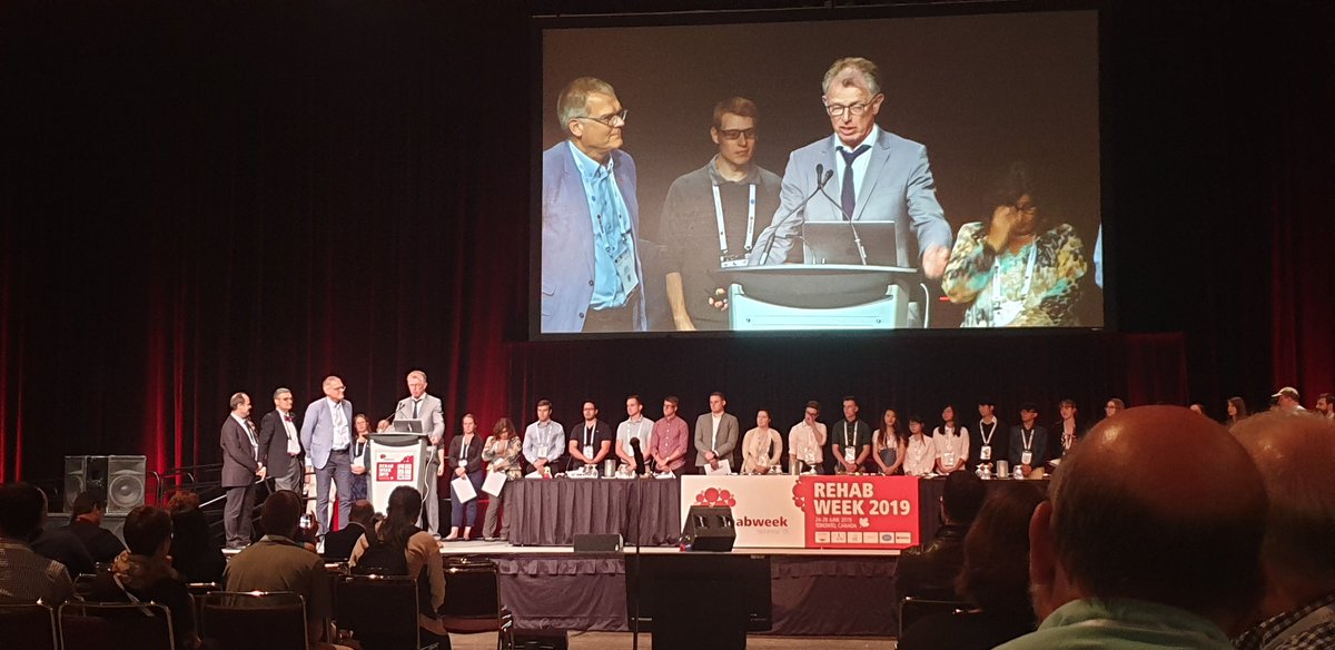 Janssen_Thomas1's tweet photo. Professors Jaap Harlaar and Hans Rietman annouce that RehabWeek2021 will take place in Rotterdam, the Netherlands. Great! Looking forward to that. #Rehabweek2019 https://t.co/svntExW5kS