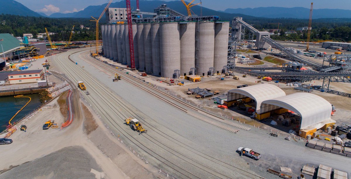G3_Connection's tweet photo. G3 Terminal Vancouver taking shape! Concrete+steel work almost complete, 2 of 3 ship loaders installed & rail loop track being laid down. It will transform grain handling on the West Coast: faster train turnarounds, rapid ship loading. Opening 2020. #westcdnag #cdnag #smarterpath https://t.co/kvTrU5Ibfb